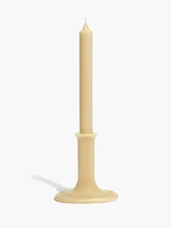 Diptyque Ambre (Amber) Taper candle with branded oval base
